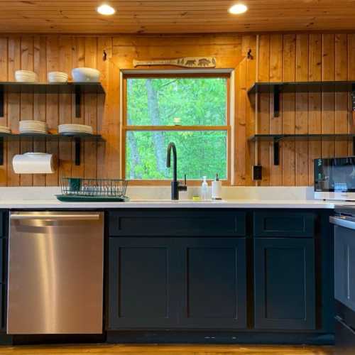 Kitchen fully renovated in May 2021! Custom cabinetry, quartz countertops, new stainless steel appliances, including a new dishwasher